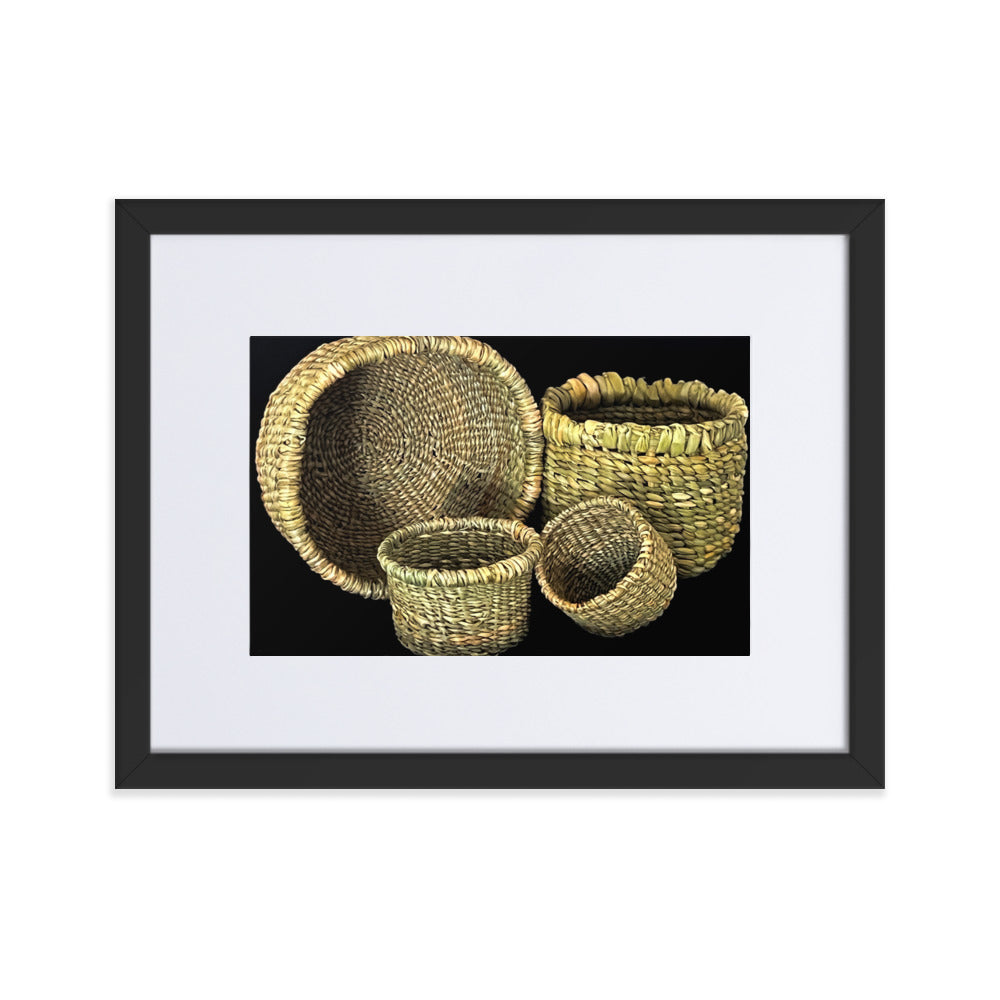 Four hand woven baskets on black background.