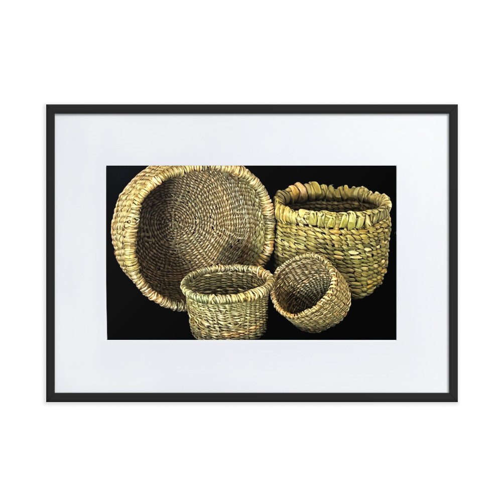 Four hand woven baskets on black background.