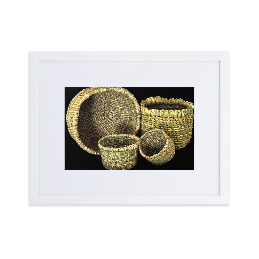 Four hand woven baskets on black background.