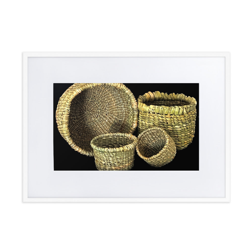 Four hand woven baskets on black background.