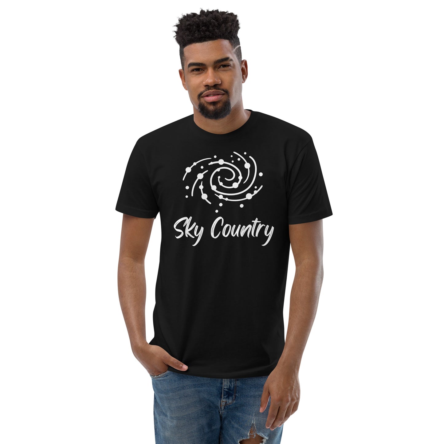 Black T-Shirt with milky way pictured on top and the words Sky Country printed underneath. Pictured with denim jeans.
